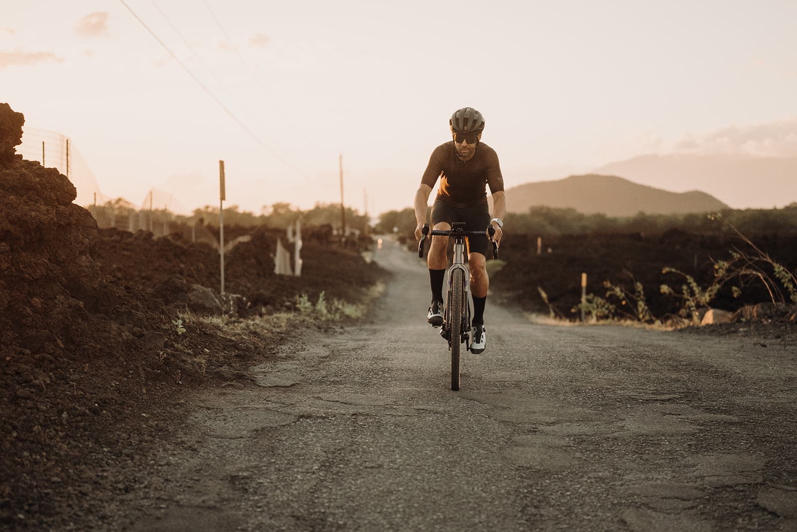Vini on a Maui gravel road at golden hour
